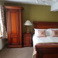 Four Poster room at The George Hotel